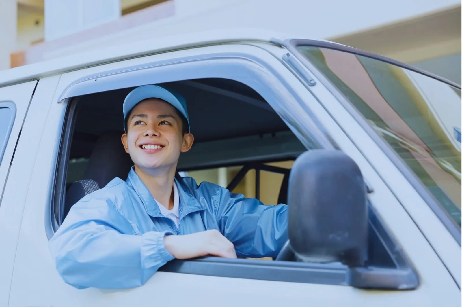 Team member in a Millers vehicle